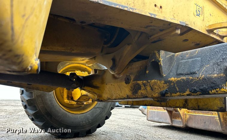 image for item DQ1068 2009 John Deere 710J  backhoe