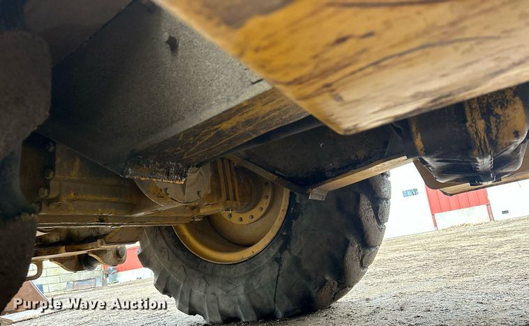 image for item DQ1068 2009 John Deere 710J  backhoe