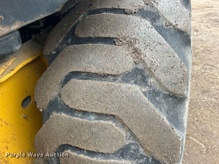 image for item DQ1068 2009 John Deere 710J  backhoe