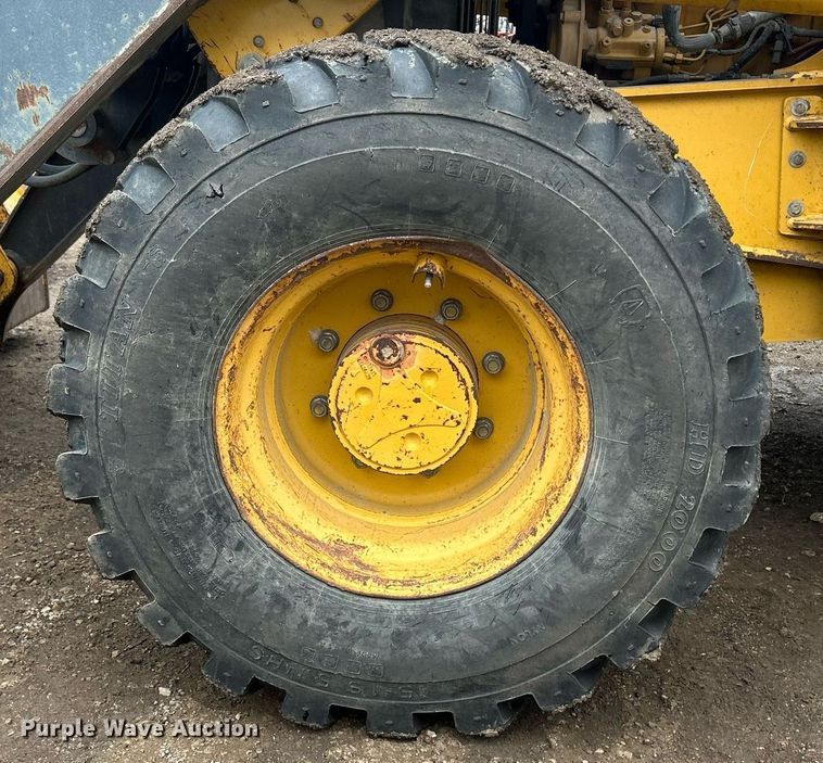 image for item DQ1068 2009 John Deere 710J  backhoe