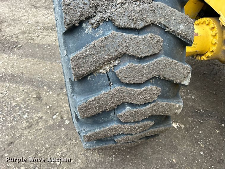 image for item DQ1068 2009 John Deere 710J  backhoe