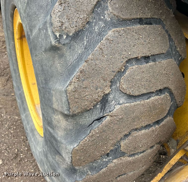 image for item DQ1068 2009 John Deere 710J  backhoe