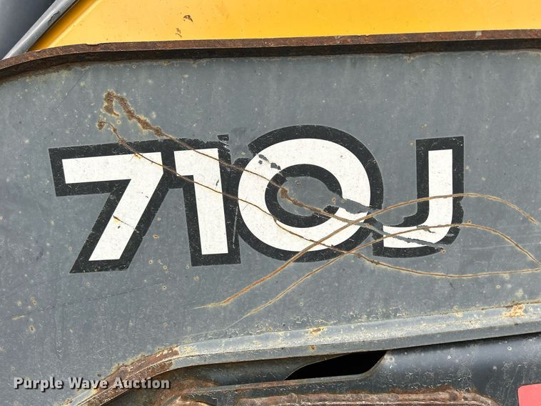 image for item DQ1068 2009 John Deere 710J  backhoe