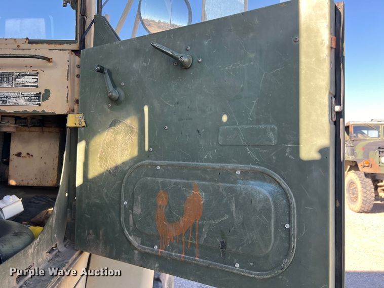 image for item DS2469 1991 BMY  flatbed truck