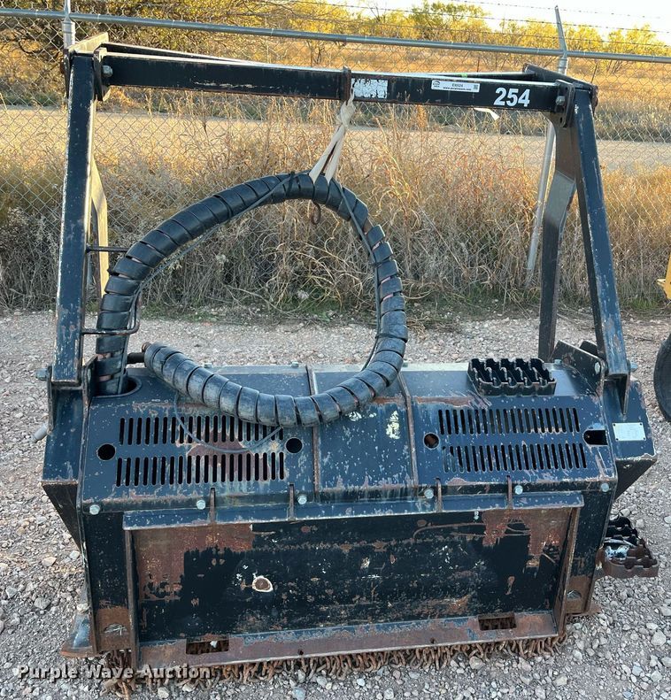 image for item EI0524 Caterpillar HM312  skid steer mulcher