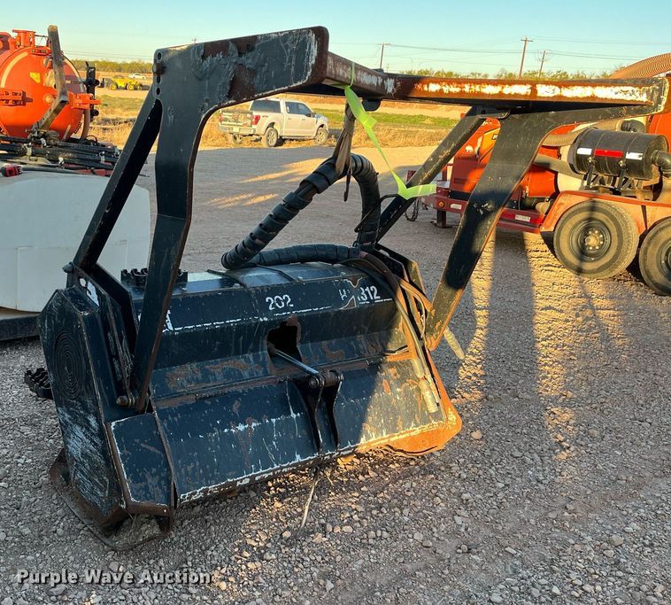 image for item EI0524 Caterpillar HM312  skid steer mulcher