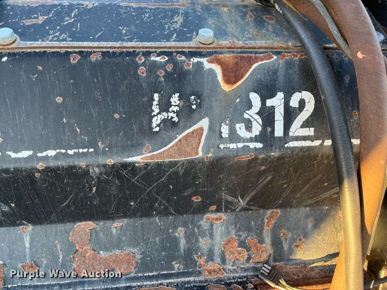 image for item EI0524 Caterpillar HM312  skid steer mulcher