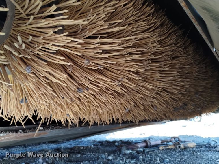 image for item LN9902 2021 Caterpillar BU115  skid steer sweeper