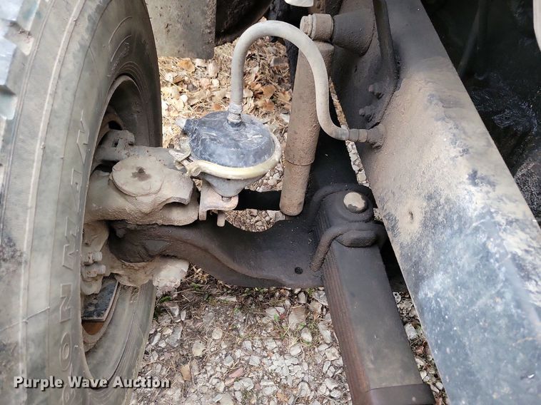 image for item LO9963 1989 Freightliner FLC 112  roll-off container truck