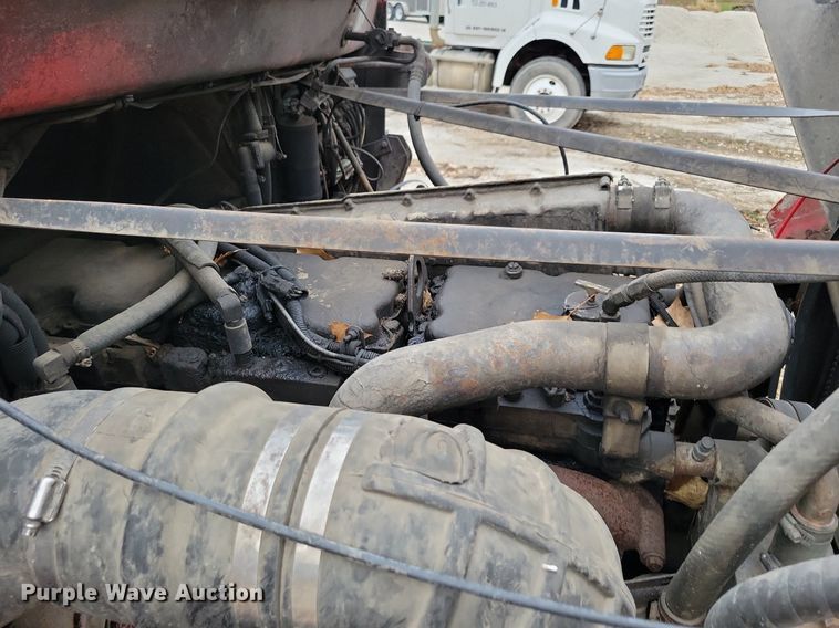 image for item LO9963 1989 Freightliner FLC 112  roll-off container truck