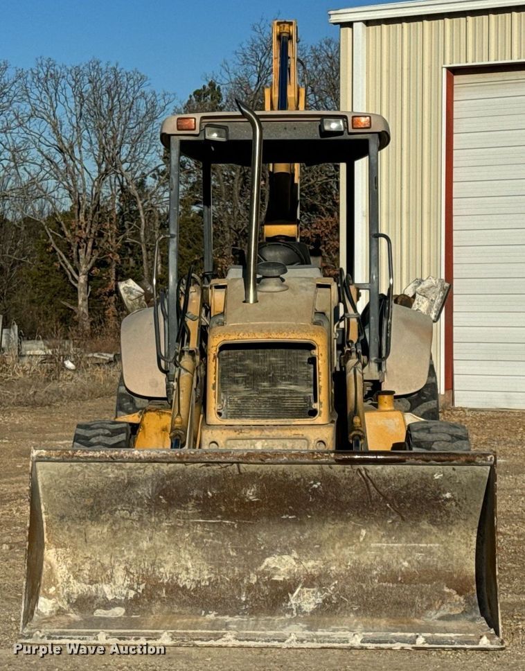 image for item NM9107 1999 New Holland 555E  backhoe