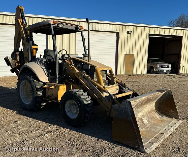 image for item NM9107 1999 New Holland 555E  backhoe