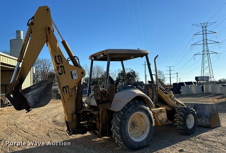 image for item NM9107 1999 New Holland 555E  backhoe