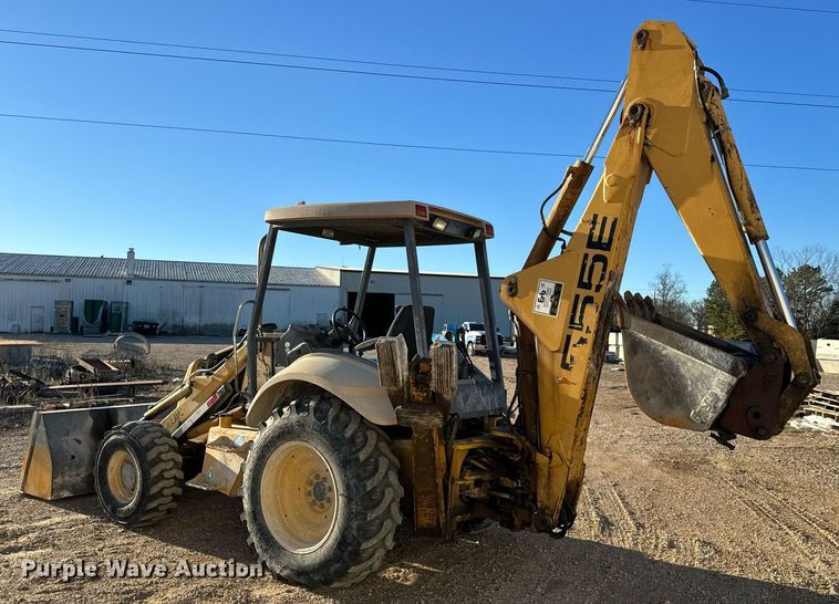 image for item NM9107 1999 New Holland 555E  backhoe