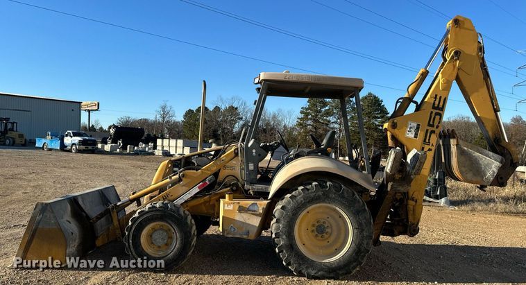 image for item NM9107 1999 New Holland 555E  backhoe