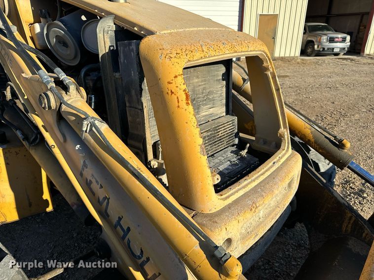 image for item NM9107 1999 New Holland 555E  backhoe