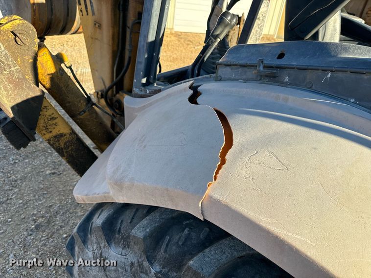 image for item NM9107 1999 New Holland 555E  backhoe