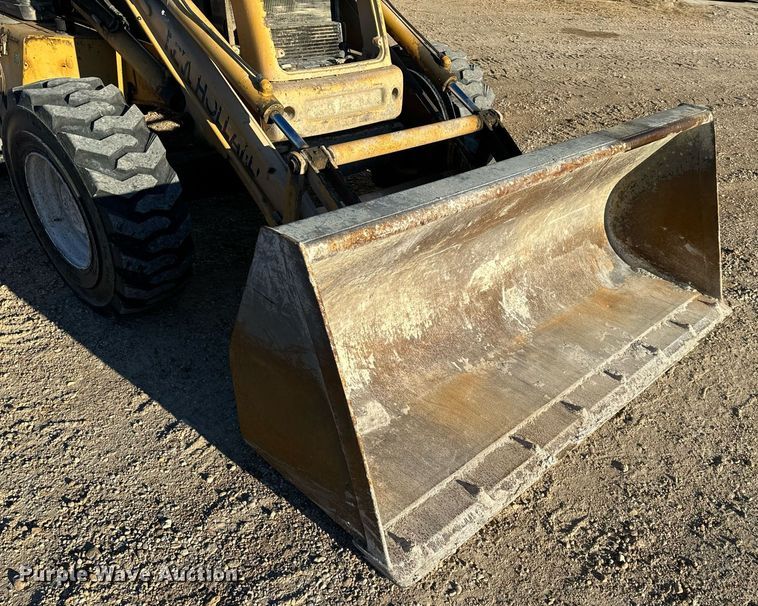 image for item NM9107 1999 New Holland 555E  backhoe