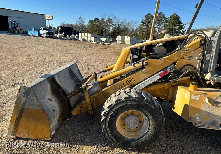 image for item NM9107 1999 New Holland 555E  backhoe