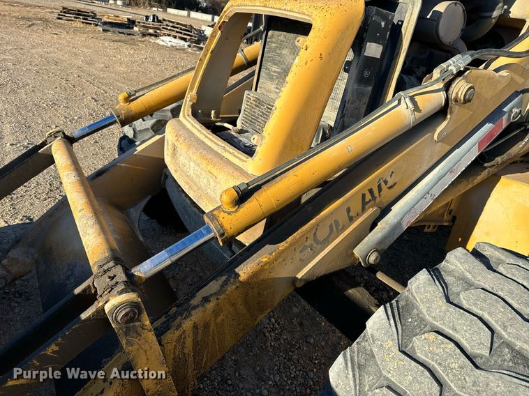 image for item NM9107 1999 New Holland 555E  backhoe