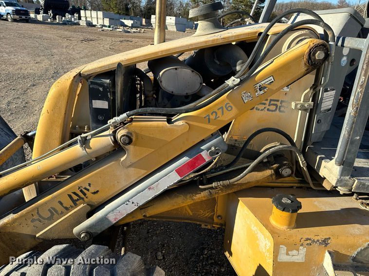 image for item NM9107 1999 New Holland 555E  backhoe