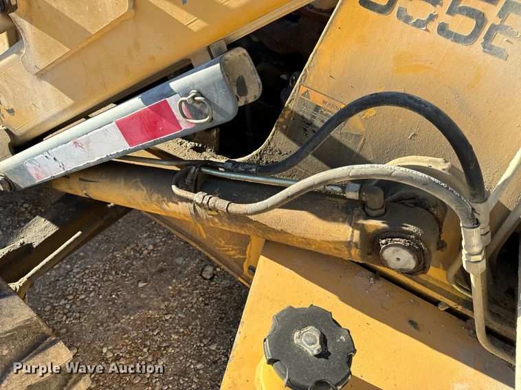 image for item NM9107 1999 New Holland 555E  backhoe