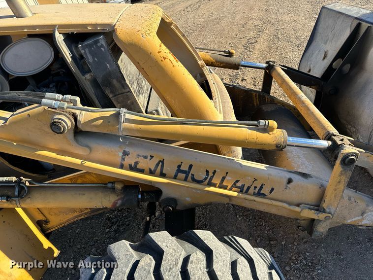 image for item NM9107 1999 New Holland 555E  backhoe
