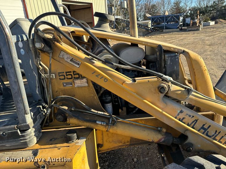 image for item NM9107 1999 New Holland 555E  backhoe