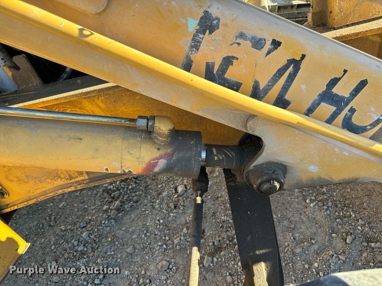 image for item NM9107 1999 New Holland 555E  backhoe