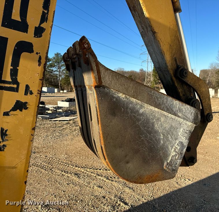 image for item NM9107 1999 New Holland 555E  backhoe