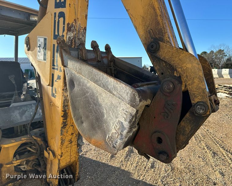 image for item NM9107 1999 New Holland 555E  backhoe