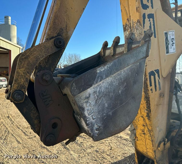 image for item NM9107 1999 New Holland 555E  backhoe