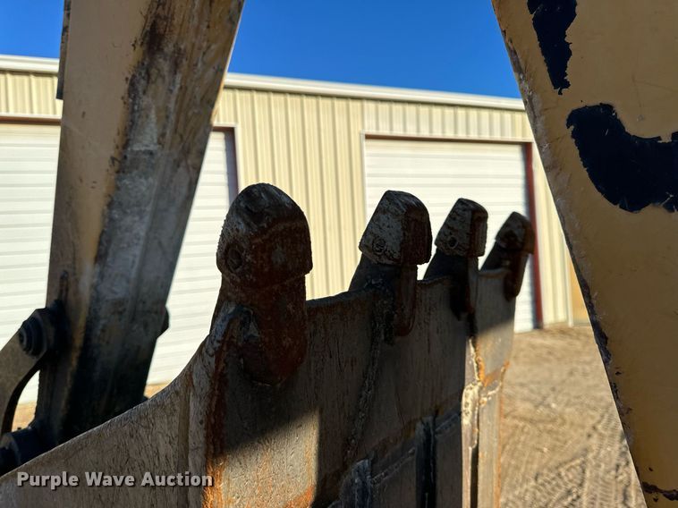 image for item NM9107 1999 New Holland 555E  backhoe