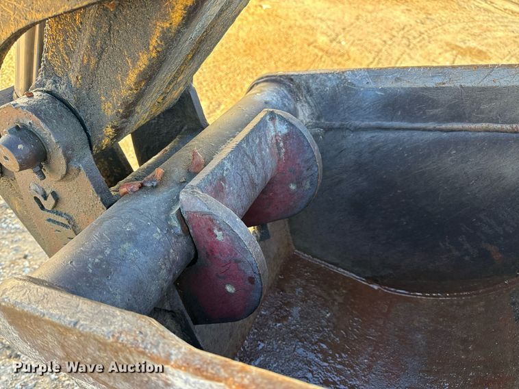 image for item NM9107 1999 New Holland 555E  backhoe