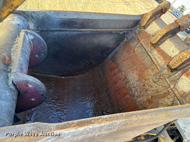 image for item NM9107 1999 New Holland 555E  backhoe