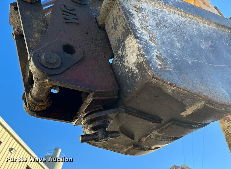 image for item NM9107 1999 New Holland 555E  backhoe