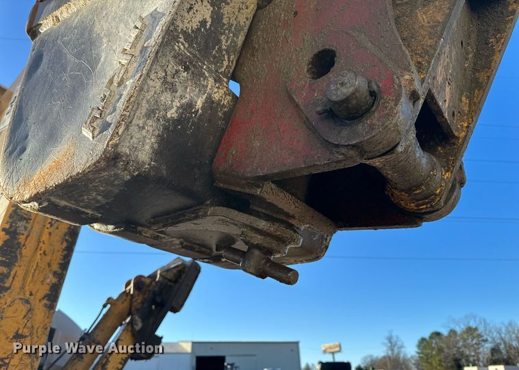 image for item NM9107 1999 New Holland 555E  backhoe