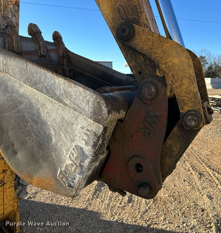 image for item NM9107 1999 New Holland 555E  backhoe