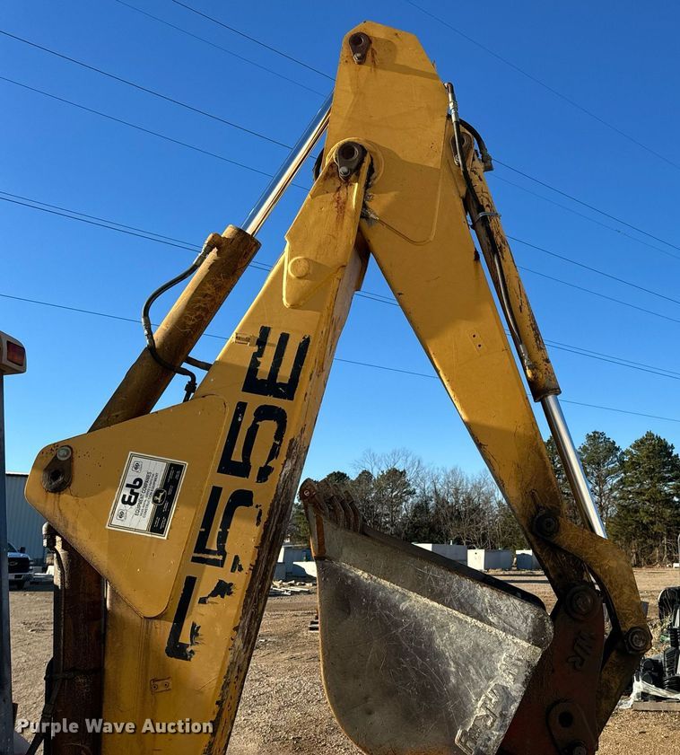 image for item NM9107 1999 New Holland 555E  backhoe