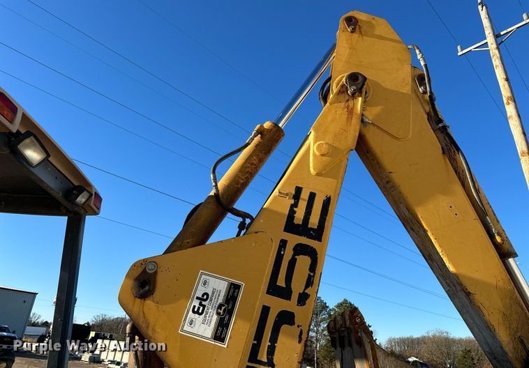 image for item NM9107 1999 New Holland 555E  backhoe