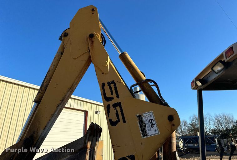image for item NM9107 1999 New Holland 555E  backhoe
