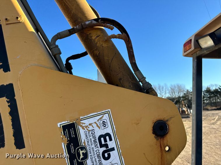 image for item NM9107 1999 New Holland 555E  backhoe