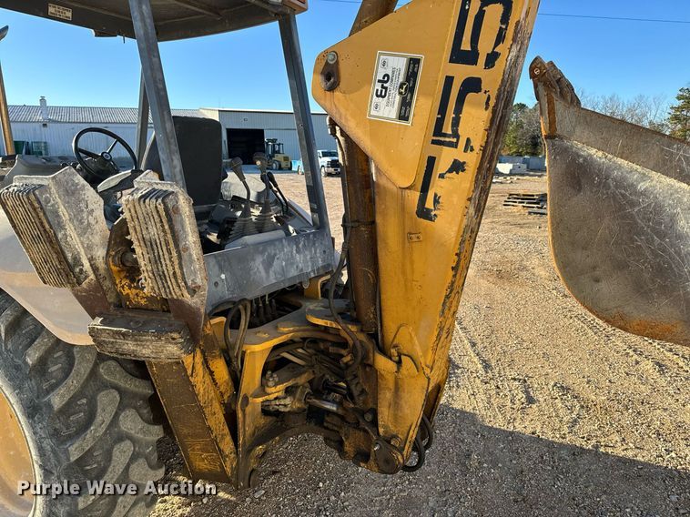 image for item NM9107 1999 New Holland 555E  backhoe