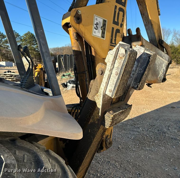 image for item NM9107 1999 New Holland 555E  backhoe