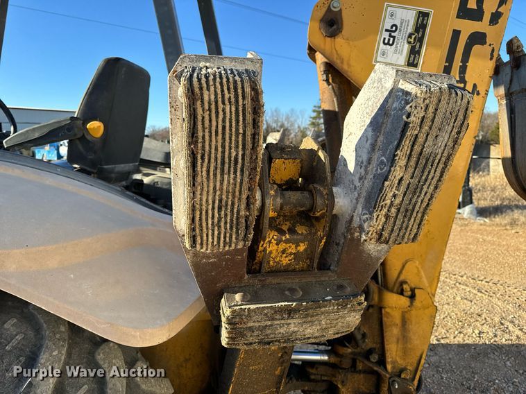 image for item NM9107 1999 New Holland 555E  backhoe