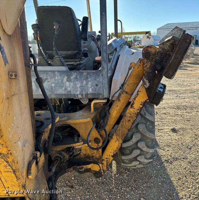 image for item NM9107 1999 New Holland 555E  backhoe