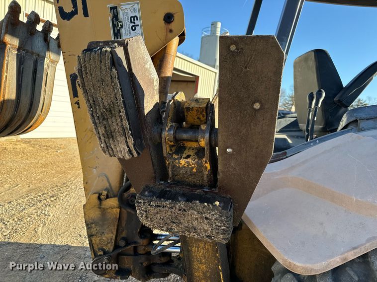 image for item NM9107 1999 New Holland 555E  backhoe