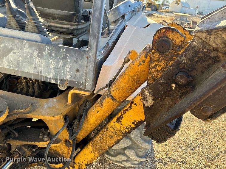 image for item NM9107 1999 New Holland 555E  backhoe