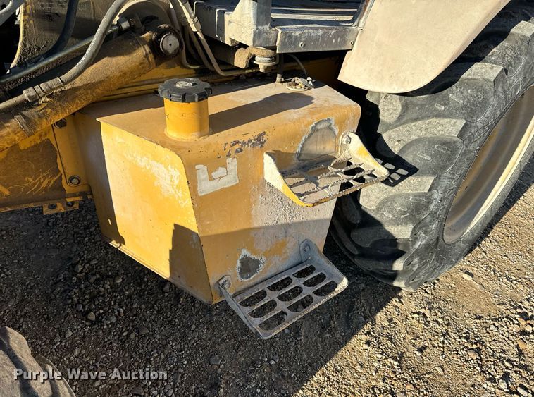 image for item NM9107 1999 New Holland 555E  backhoe