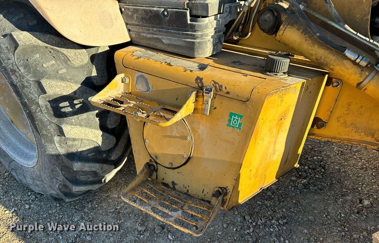 image for item NM9107 1999 New Holland 555E  backhoe